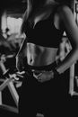 Woman Wearing Black Sports Bra and Legging Working Out