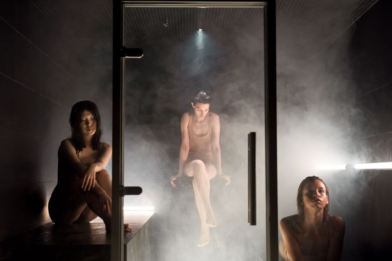 Steam room interior with misty atmosphere and soft lighting