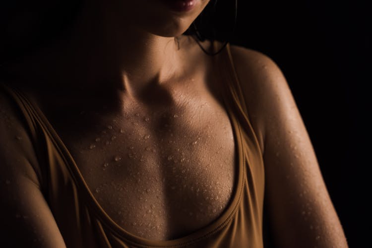 Close Up Photo Of Wet Chest Of A Woman 