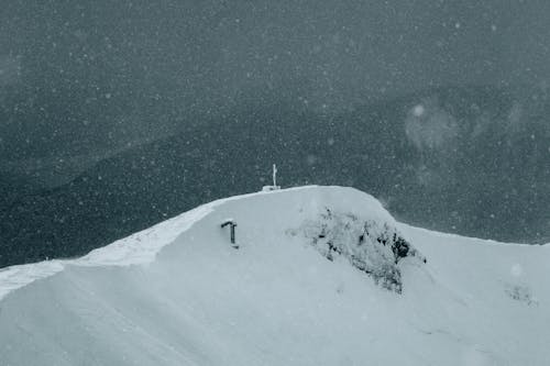 View of a Mountain Peak at Snowstorm 