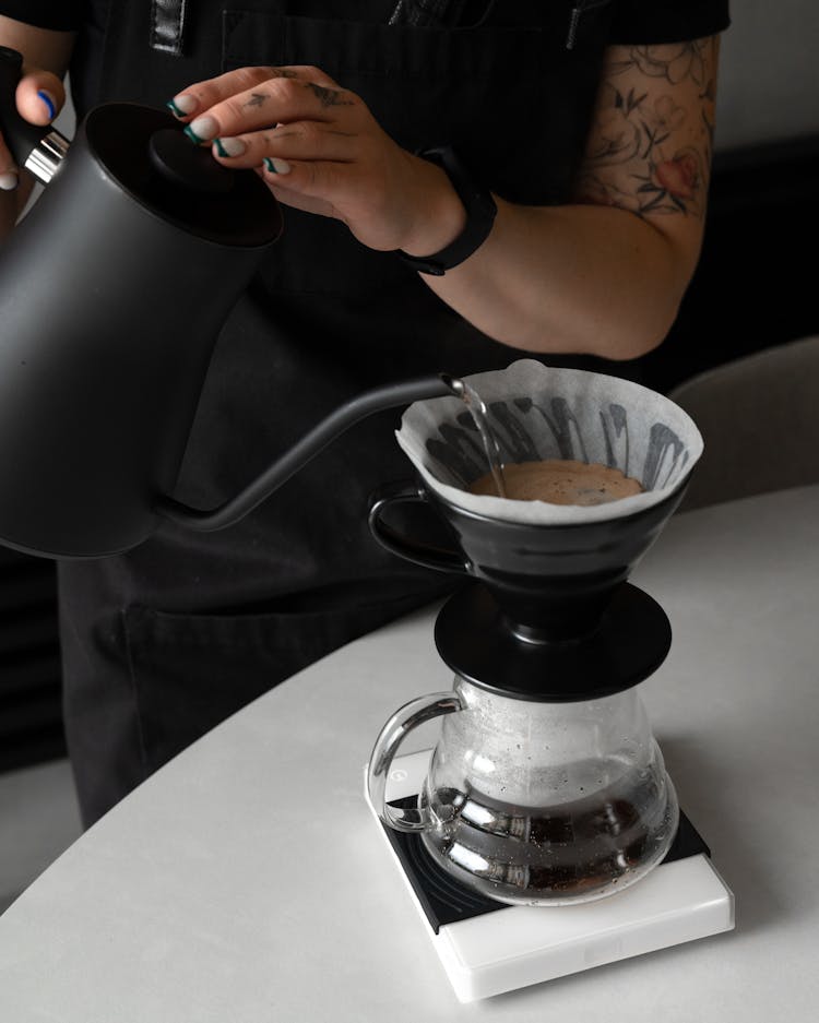 Woman Barista Making Filter Coffee