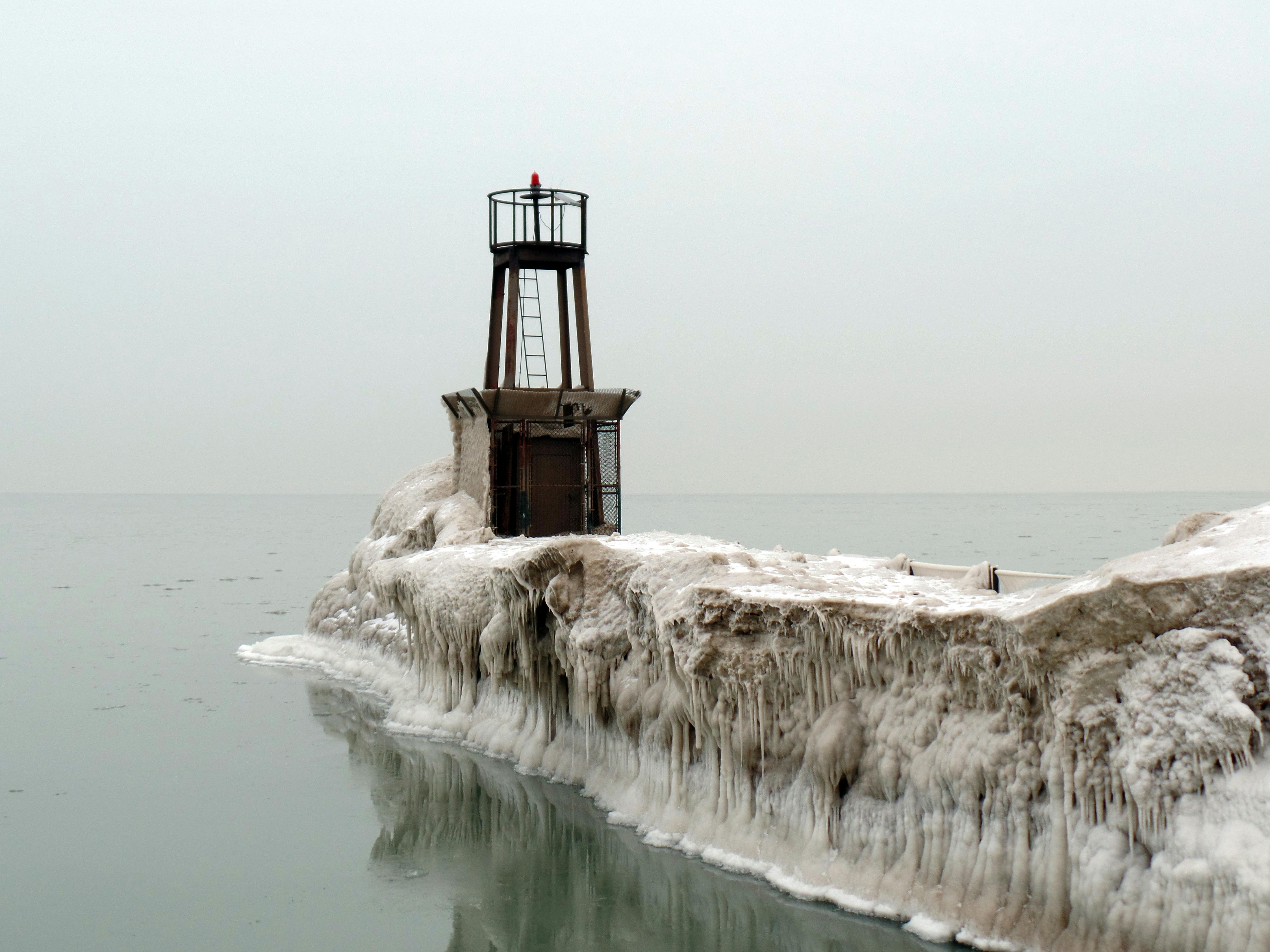 Home inspection after ice storm showing damage assessment and recovery planning for winter weather impacts