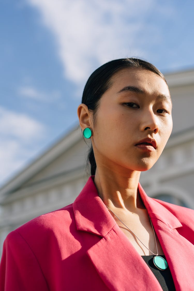 A Woman In Fuchsia Pink Collared Shirt