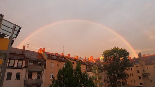 Immagine gratuita di arcobaleno, case, cielo