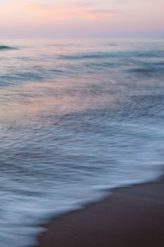 Blurred wave movements along Matanzas beach at sunset create a calming, painterly effect.