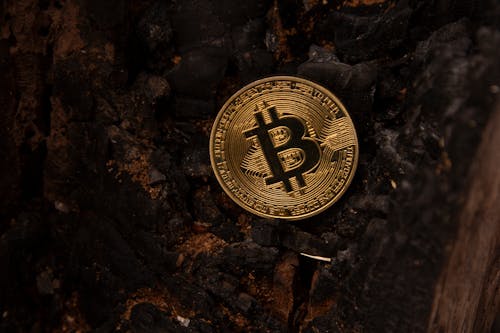 Free A Bitcoin on a Table Stock Photo