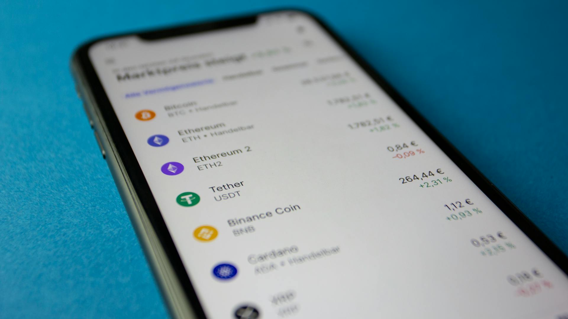 Close-Up of a Smart Phone Screen Displaying a Cryptocurrency Stock Market Values