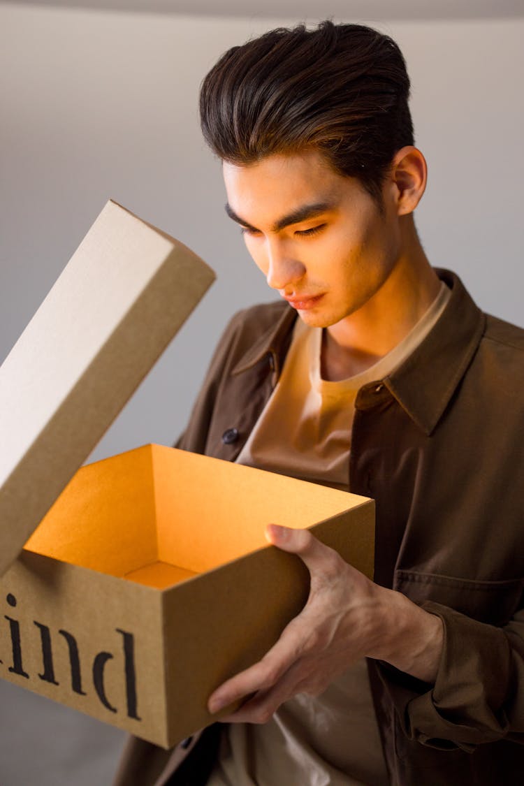 A Person Looking At The Box