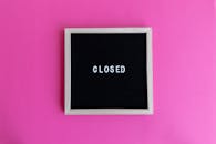Text in Picture Frame on Pink Background