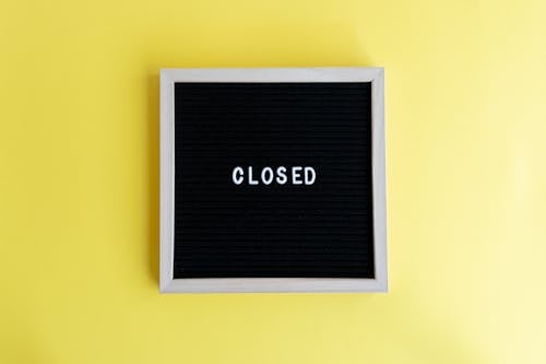 Word in Frame on Yellow Studio Background