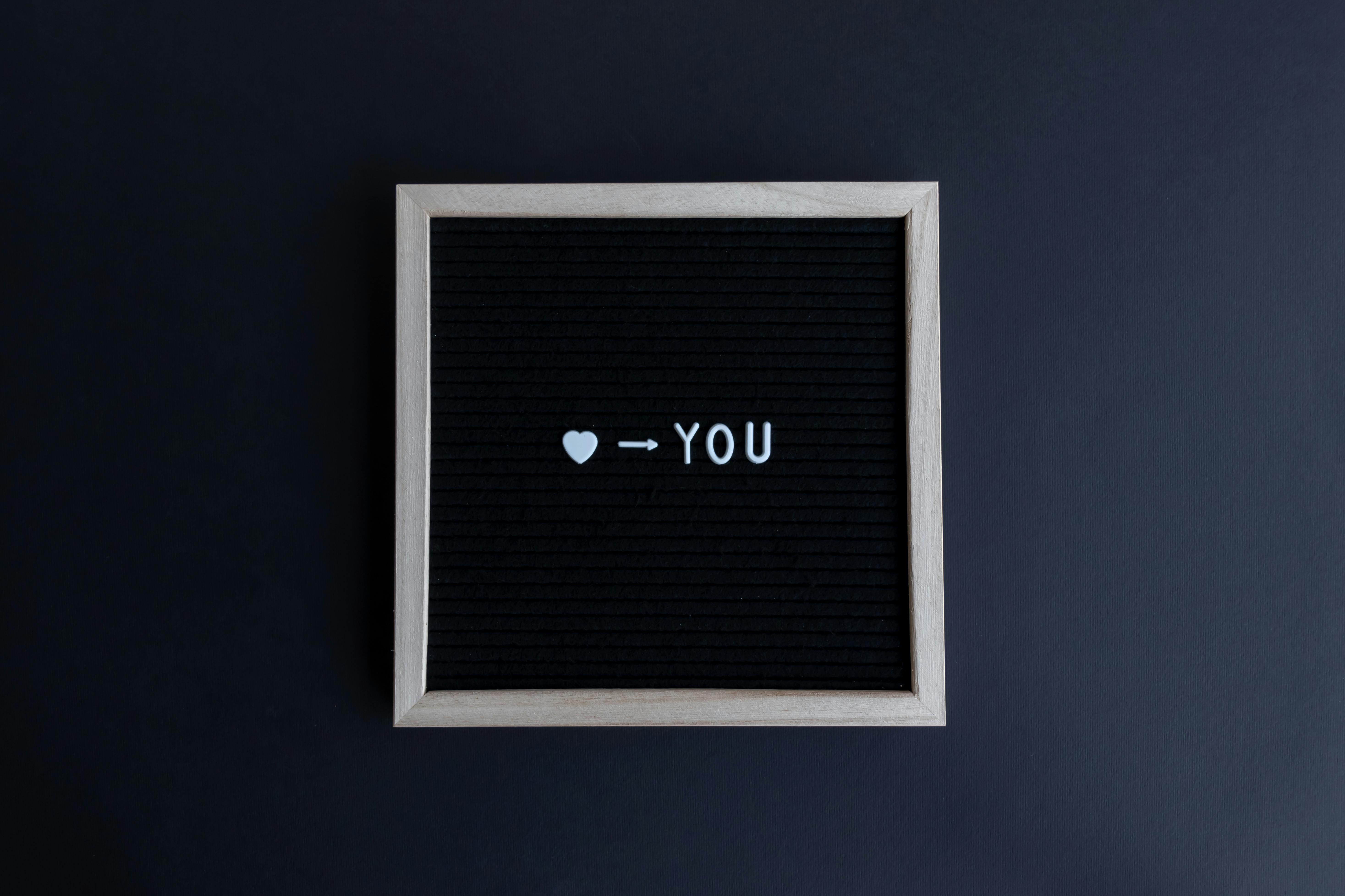 i love you text on a letter board on a gray background