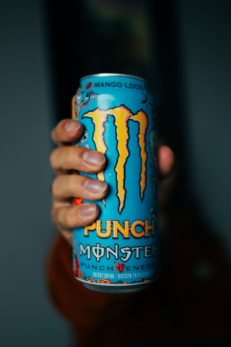 Hand Holding A Canned Drink 