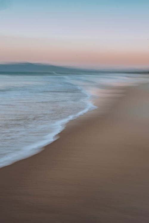 Foto profissional grátis de areia, cênico, céu