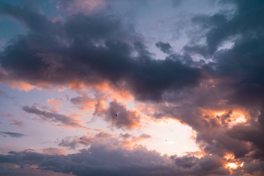 Moody and dramatic clouds at sunset in Delfzijl, Netherlands, creating a picturesque sky.