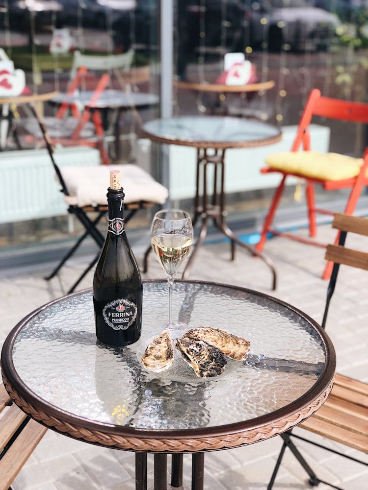 A Champagne Bottle On A Table