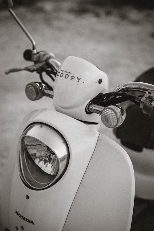Free Close-Up Shot of White Motorcycle Stock Photo