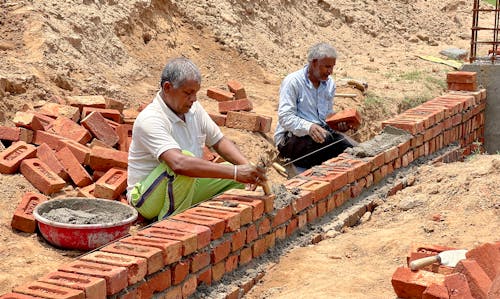 Elderly Man Working on Construction Site