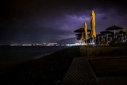 Free stock photo of above sea, at night, clouds in the sky