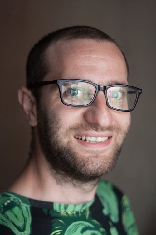 Man with Facial Hair Wearing Eyeglasses