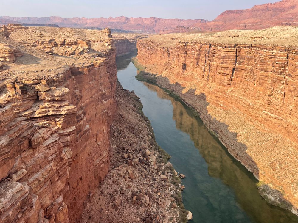 Natural Formations Rivers Natural Rock Formation Beside a River · Free Stock Photo