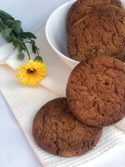 Cookies Beside a Yellow Flower