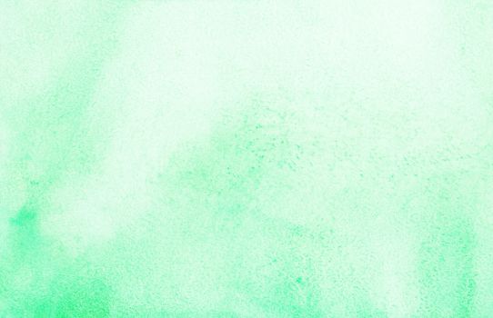 A soft light green watercolor texture background ideal for design use.