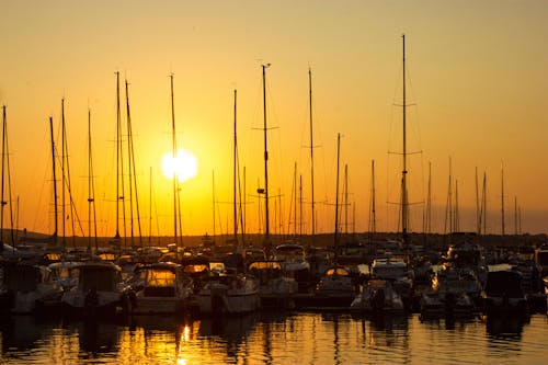 Free Boats Dock on the Harbor During Sunset Stock Photo