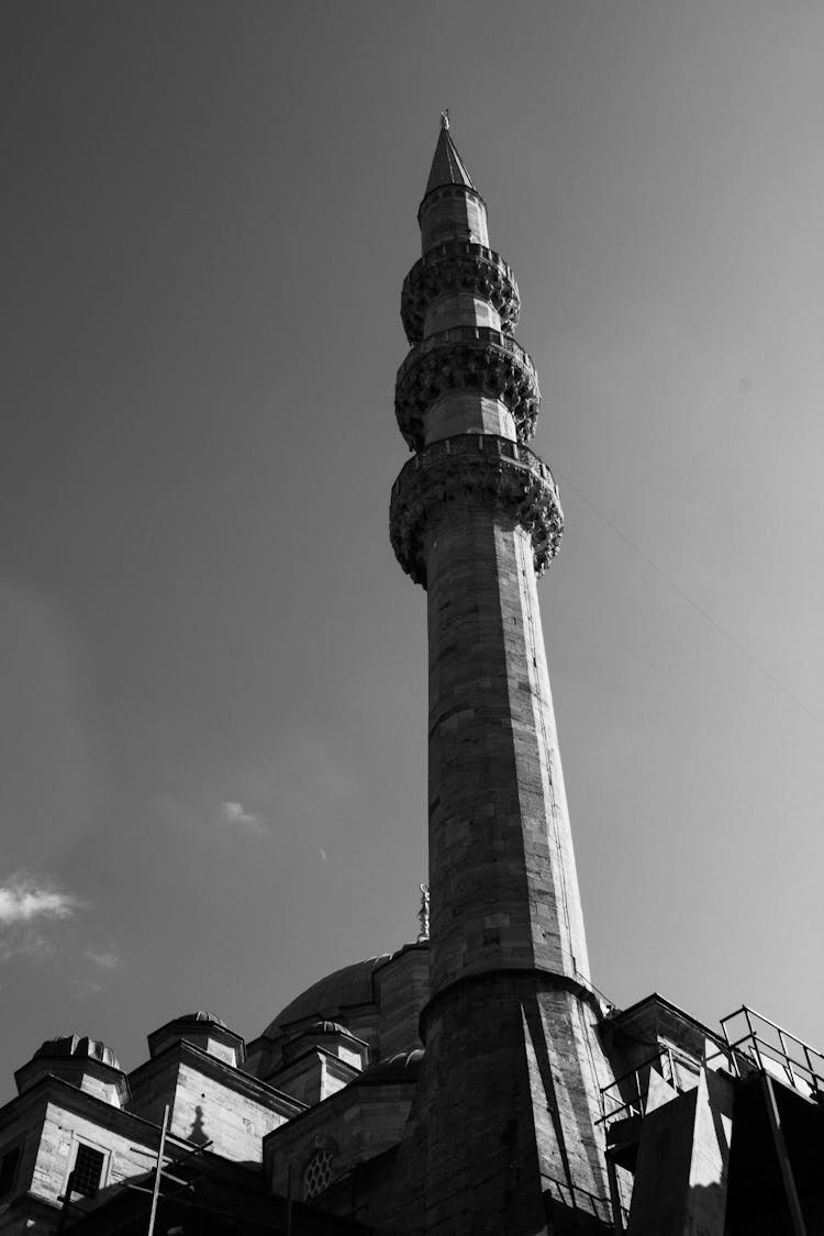 Stone Minaret On Sky Background