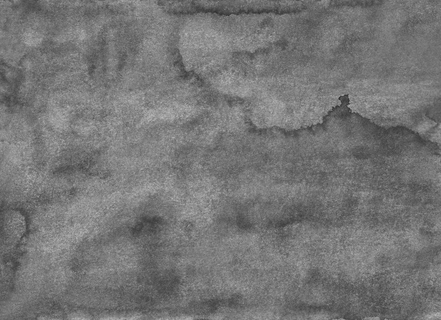 Gray textured wall with a weathered, worn appearance, perfect for backgrounds.