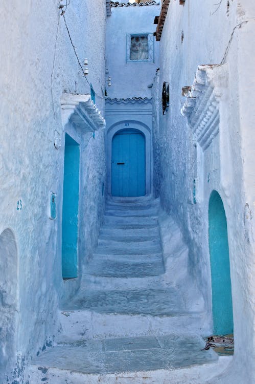 A Narrow Alley between Concrete Buildings