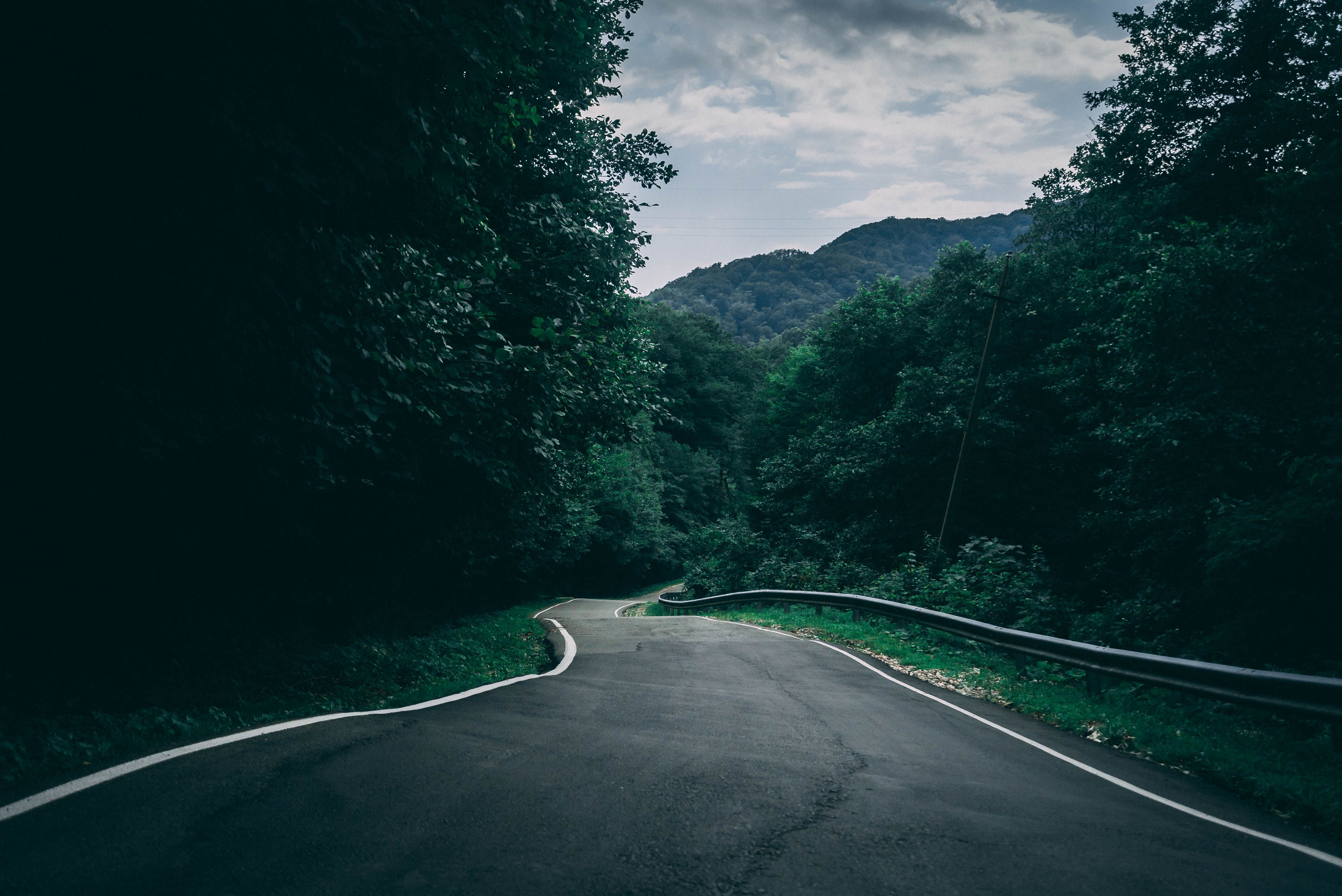 Ghat road curving through green Sahyadri hills east of Mumbai