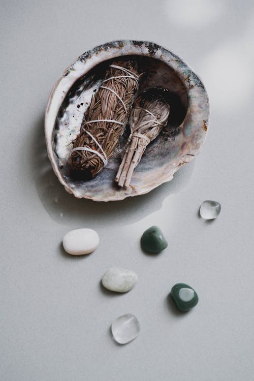 Free Gemstones Beside a Seashell  Stock Photo