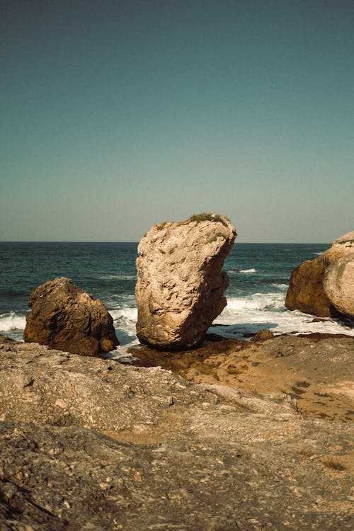 Free Rocks Formation on Sea Shore Stock Photo