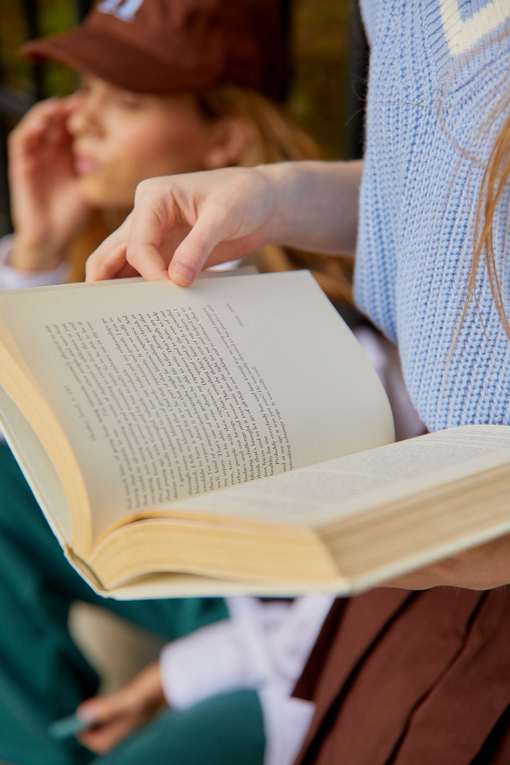 Person Holding a Book · Free Stock Photo
