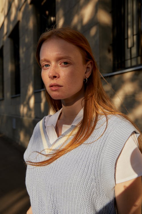 A Woman in White Knited Sweater