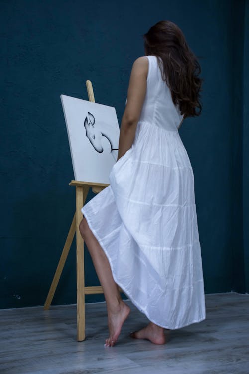 Back View of a Woman in a White Dress Painting