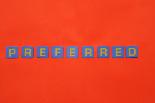 Close-Up Shot of Text on a Red Surface