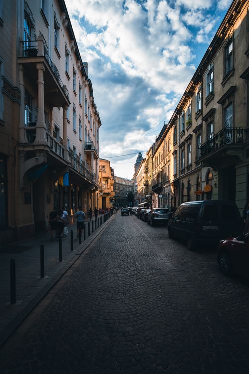 Free Captivating urban scene in Lviv, Ukraine, featuring historic architecture and bustling street life. Stock Photo