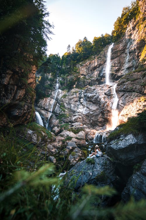 Brown Rocky Wall with Waterfalls