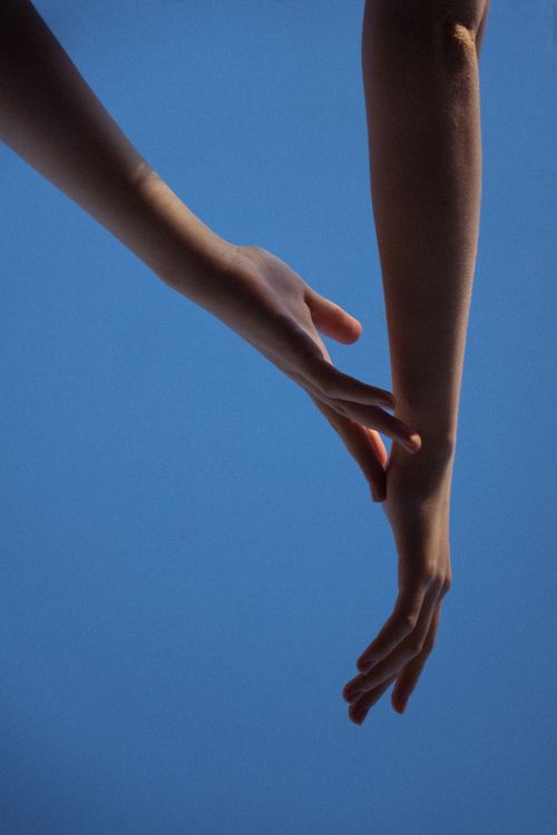 Hands under Blue Sky · Free Stock Photo