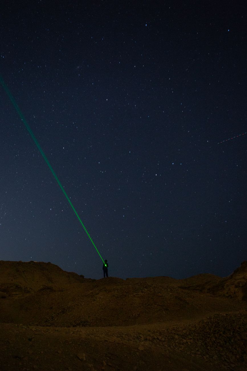 Why Astronomers Fire Lasers Skyward for Epic Universe Views