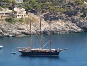 Black and White Boat on Sea