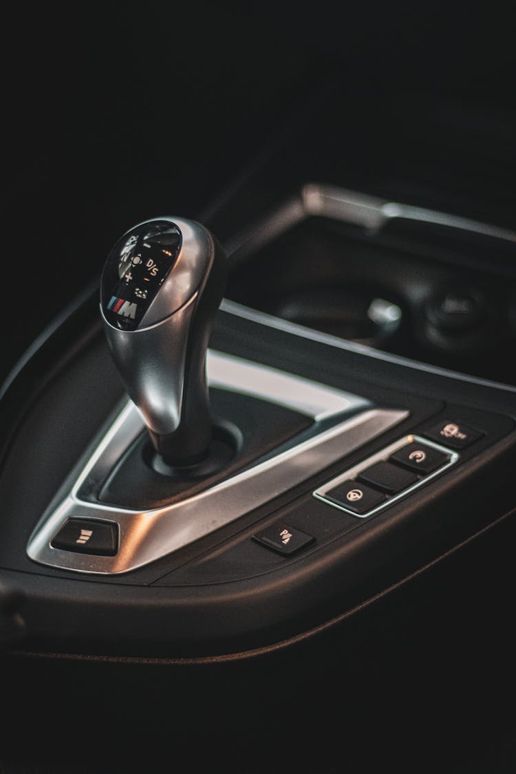 A Black And Silver Automatic Gear Shift Lever