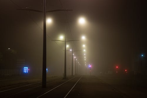 Free Street Lights Turned on during Night Time Stock Photo