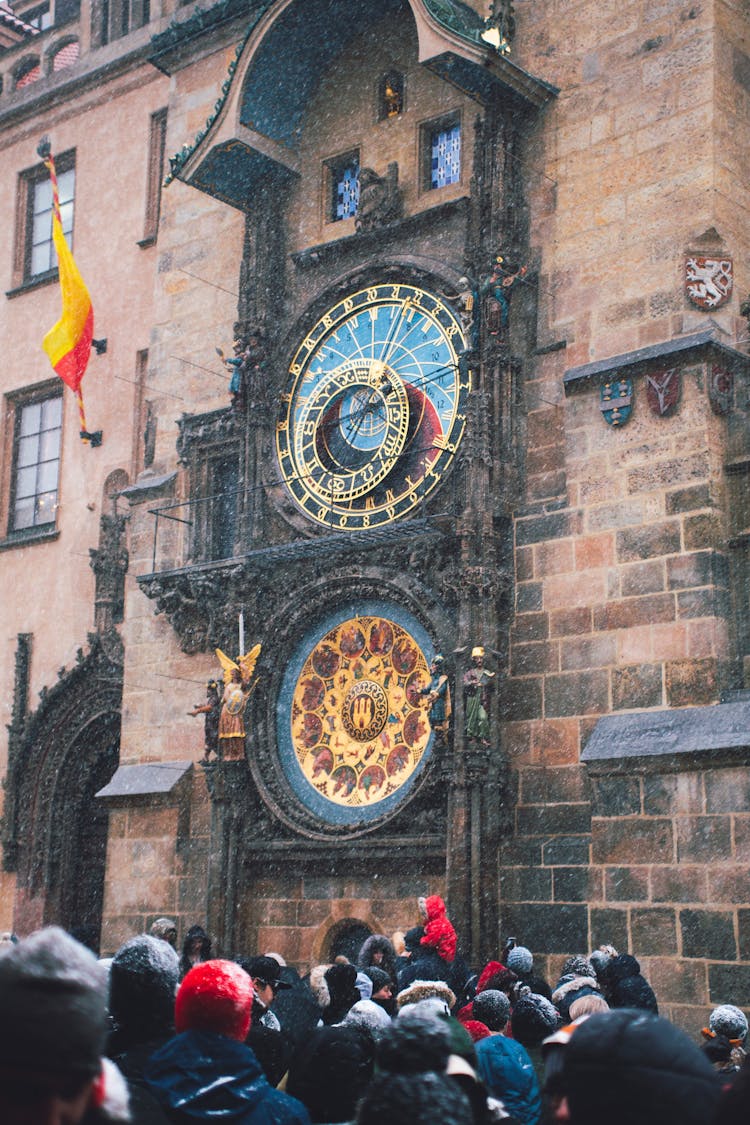 Brown And Black Analog Clock On Wall