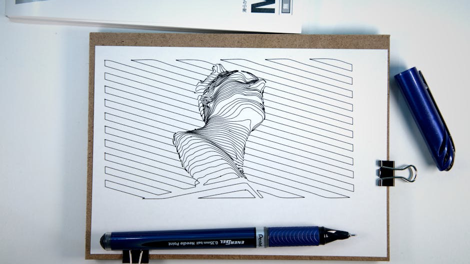 A modern line art drawing on a clipboard showcasing creative design and sketching tools.