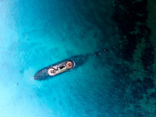 Free A Sunken Ship in the Middle of the Ocean Stock Photo