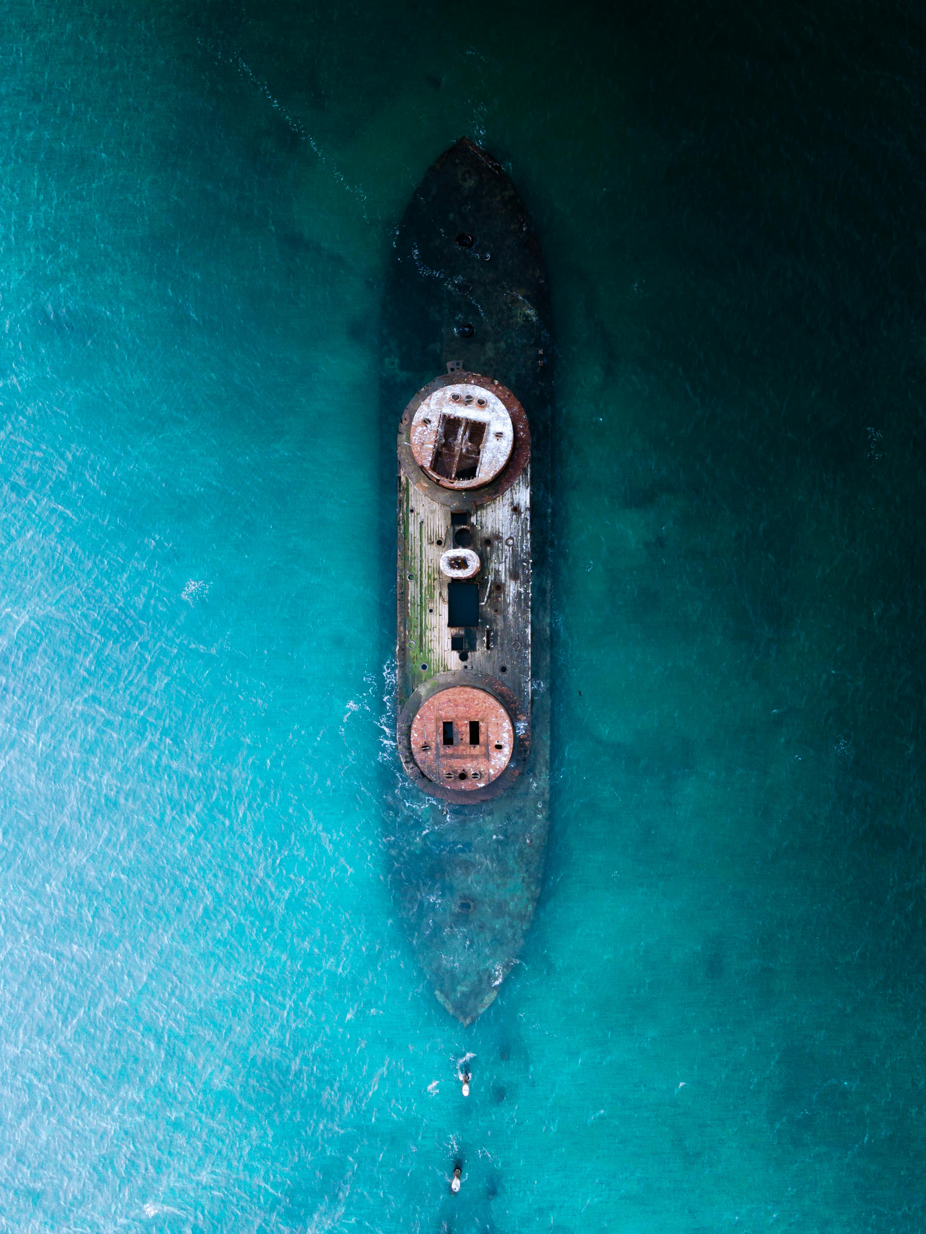 Stunning aerial photograph of a shipwreck submerged in turquoise waters off the coast of Melbourne, Australia.