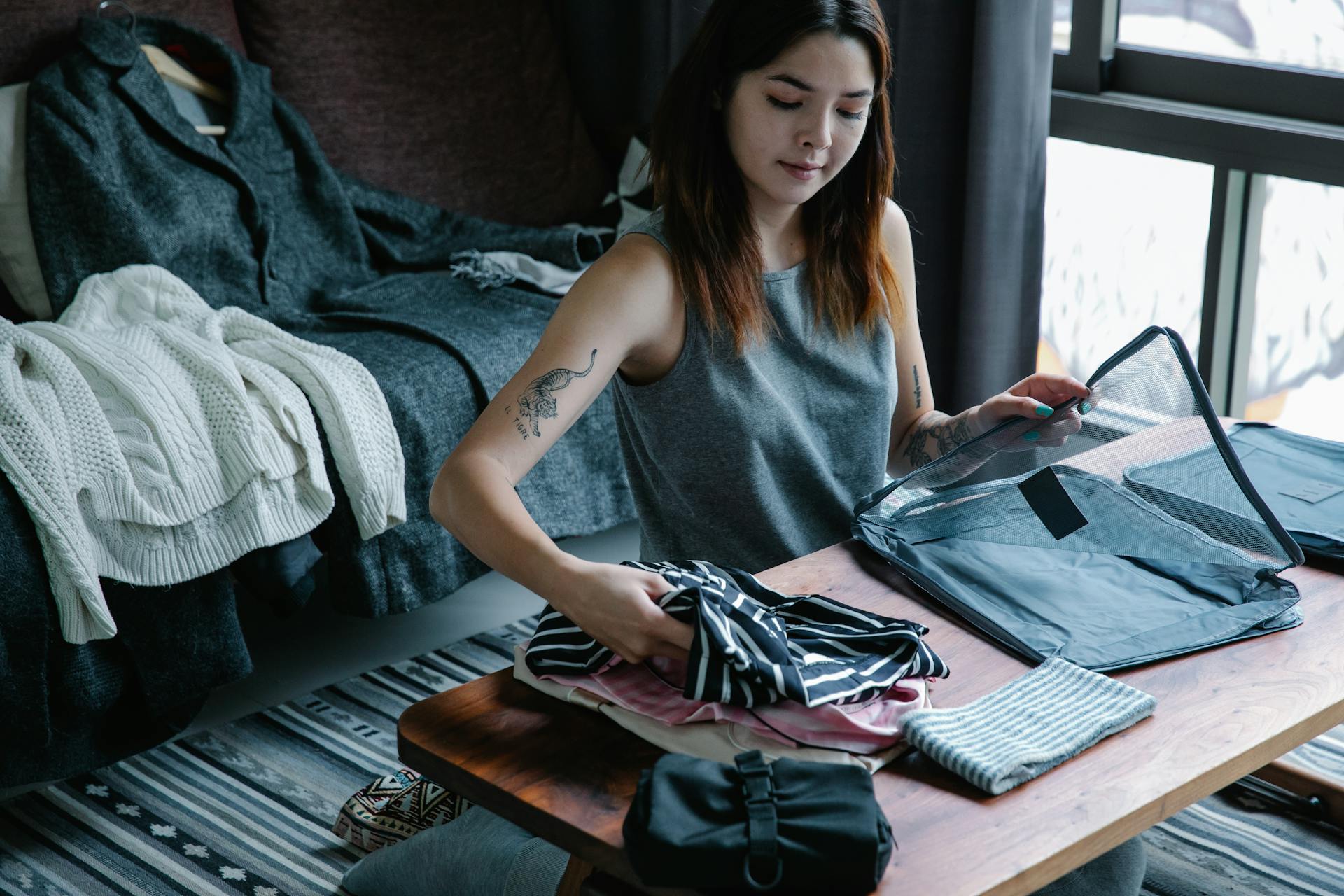 A Woman Packing Up Her Things