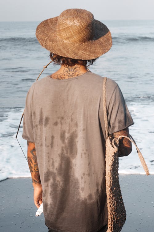 Gratis lagerfoto af brun hat, hav, lodret skud